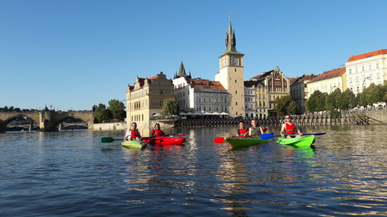 View of Charles Bridge from kayak on river Vltava